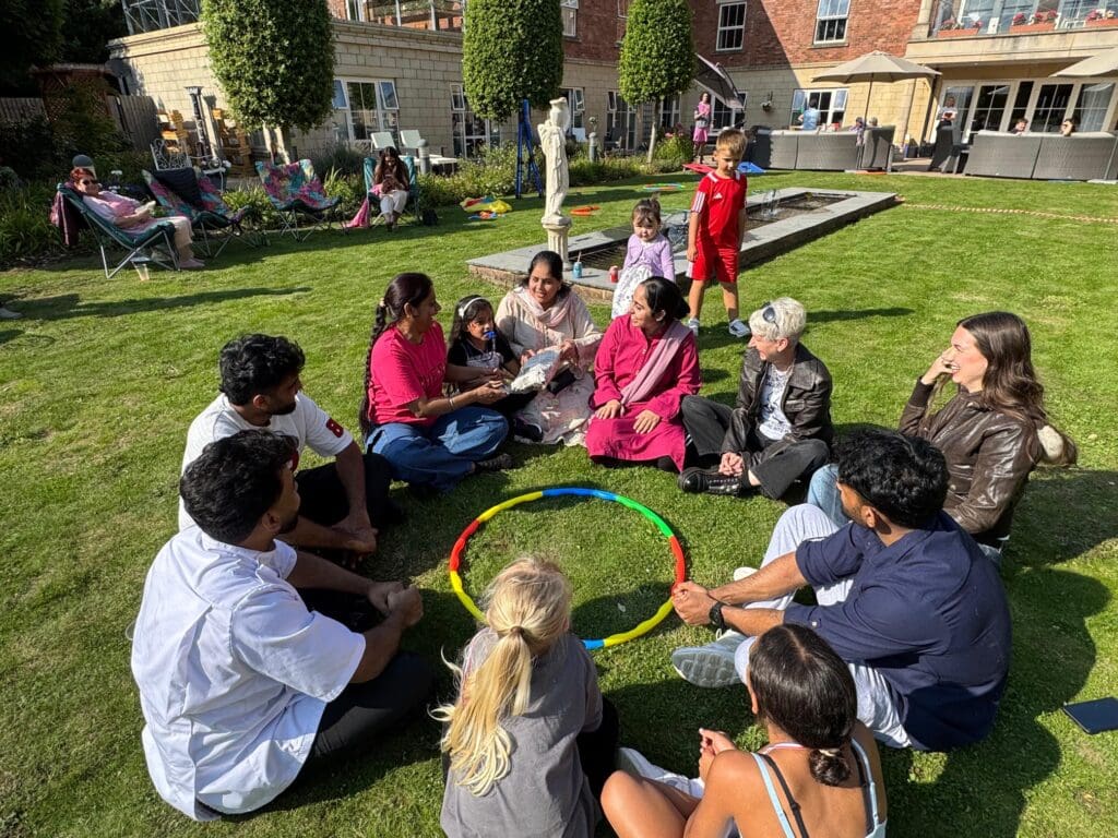 Families and friends of our Chiltern Grange care home staff enjoying a sunny afternoon together.