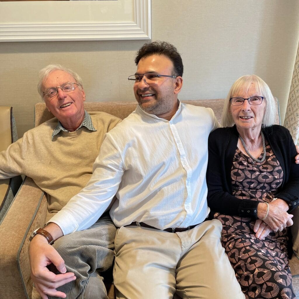 Ammar, celebrating his win of Woodland Manor care home’s Employee of the Month, with two of our residents.
